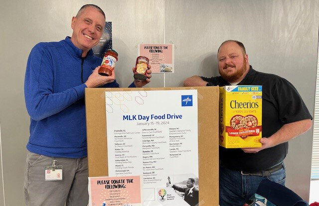 Gerald Brown (l.) and Timothy Hughes participated in Medline&rsquo;s Montgomery MLK Day Food Drive.