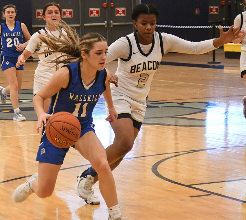 Wallkill&rsquo;s Zoe Mesuch drives toward the basket as Beacon&rsquo;s Zalayni Shand (2) and Reilly Landisi pursue during a non-league girls&rsquo; basketball game on Feb. 6 at Beacon High School.