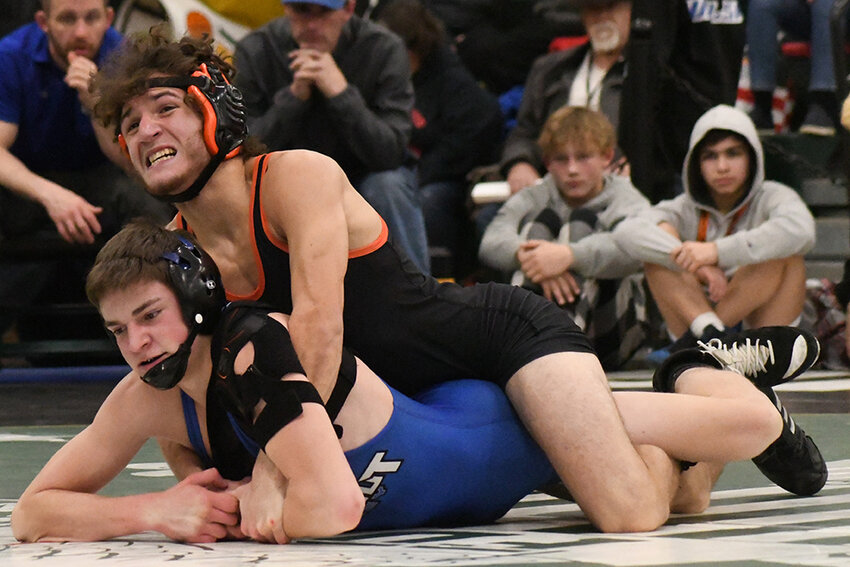 Marlboro’s Reese Greathouse works on top of Rondout Valley’s Nick Laskowski during a 131-pound championship bout at Sunday’s Section 9 Division II wrestling tournament at Franklin D. Roosevelt High School in Hyde Park.