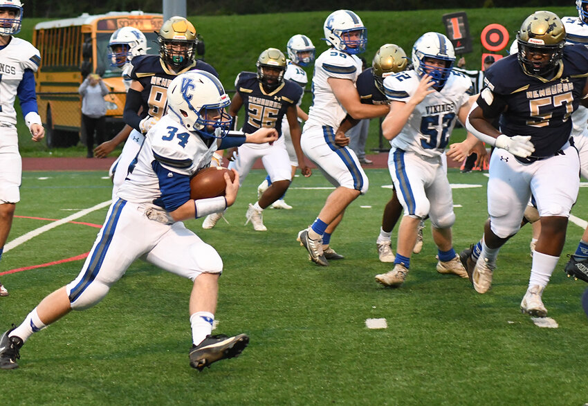 Newburgh’s Fabian Rhoden looks to make a tackle on Valley Central running back Matt Bond during a Class AA football game on Sept. 28, 2023, at Academy Field in Newburgh. Rhoden recently signed and accepted a scholarship to continue his academic and football career at the University of New Haven.