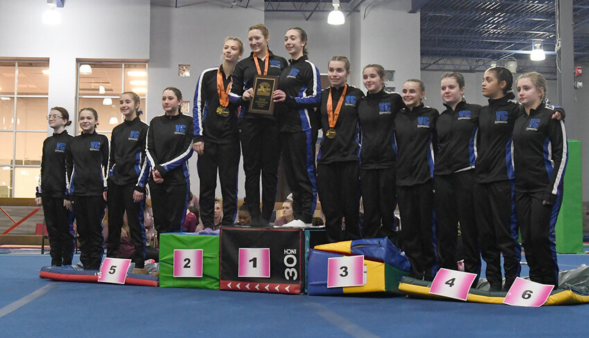 The Valley Central Vikings pose with the championship plaque after winning their third straight Section 9 gymnastics championship on Feb. 12 at Epik Athletics in Middletown.