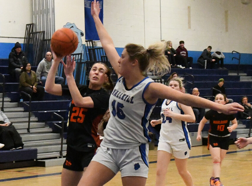 Marlboro&rsquo;s Gabby Murphy goes up for a shot as Wallkill&rsquo;s Amy Crowley defends during Friday&rsquo;s non-league girls&rsquo; basketball game at Wallkill Senior High School.
