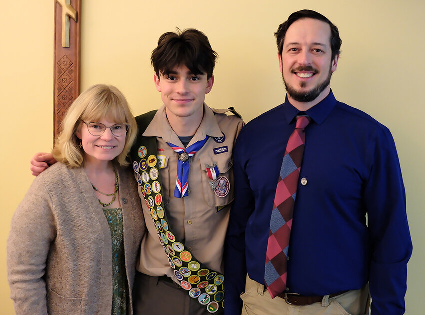 Basil Metz posed with his parents, Tania and Steven, after the Eagle Scout Court Of Honor