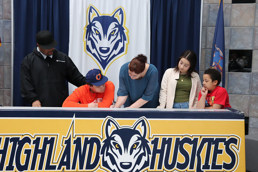 Highland&rsquo;s A.J. Grant signs his commitment to continue his baseball career at SUNY Orange at a ceremony on March 5 at Highland High School.