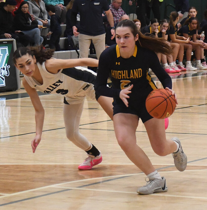 Highland’s Grace Koehler drives the basketball as Putnam Valley’s Nai Torres defends during a NYSPHSAA Class B subregional girls’ basketball game on March 5 at Yorktown High School.