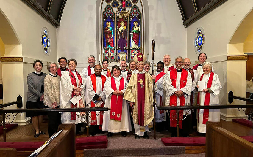 Nicole Hanley (center) with fellow priests of the Diocese of New York.