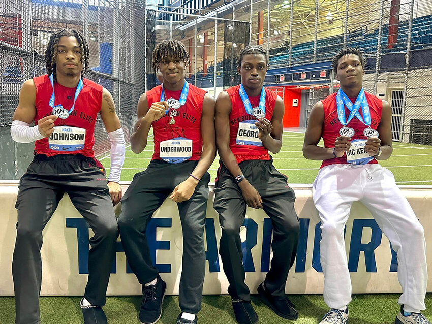 Newburgh Elite Track Club runners Nakei Johnson, Jeron Underwood, Kendy Georges and DeJuan McKenzie pose with their medals at Nike Indoor Nationals on March 10 at the Armory Track and Field Center in New York City.