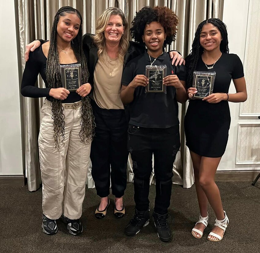Pine Bush&rsquo;s Top 5 players, from left, Ketura Rutty, Jah-esa Stokes and Leticia Watson are shown with Pine Bush coach Michelle Bouffard, second from left.