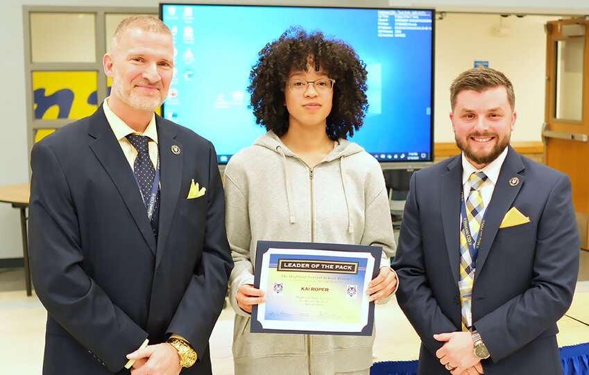 Kai Roper is the Highland High School Leader of the Pack for March. He is flanked by Principal Kevin Murphy [L] and Asst. Principal Brandon Opitz