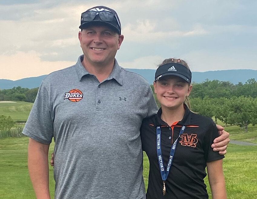 Marlboro’s Alexa Trapani is shown with her father and coach, Gary Trapani after the Section 9 girls’ golf tournament at Apple Greens Golf Course.