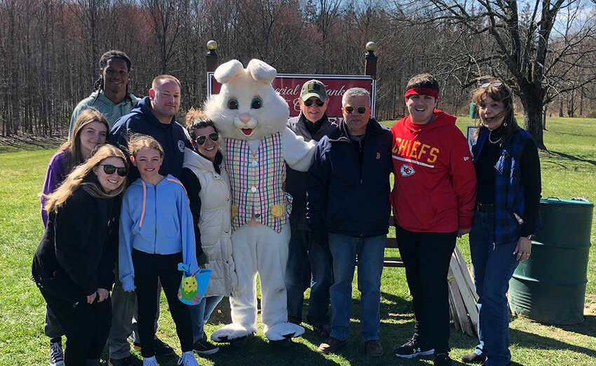 The Easter Bunny with members of the village&rsquo;s parks and recreation department.