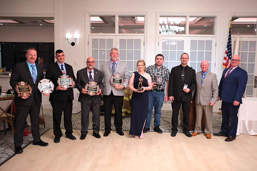 Seven members of the department received plaques to honor their service; L-R Erick Masten for serving as a past Fire Chief and for Top Responder for an Officer; Marc Ciaglia for Top Responder for a Firefighter; Robert Troncillito as Top Responder for a Driver; Kevin Casey as a Line Officer; Katerina Giofree for Firefighter of the Year; Paul DeAngelis for his past duty as a Lieutenant from 2020-2023; David Scaturro for his 25 years of Active Service to the department, followed by Chief Mike Troncillito and 2nd Asst Chief Lenny Scaturro