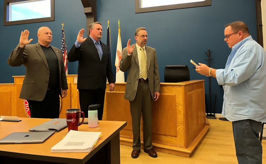 Maybrook Village Clerk/Treasurer David Griffith (far right)  swears in newly re-elected village board members l-r) Deputy mayor Charles Woznick, Mayor Dennis Leahy and Trustee Daryl Capozzoli during the board’s recent annual  reorganization meeting.