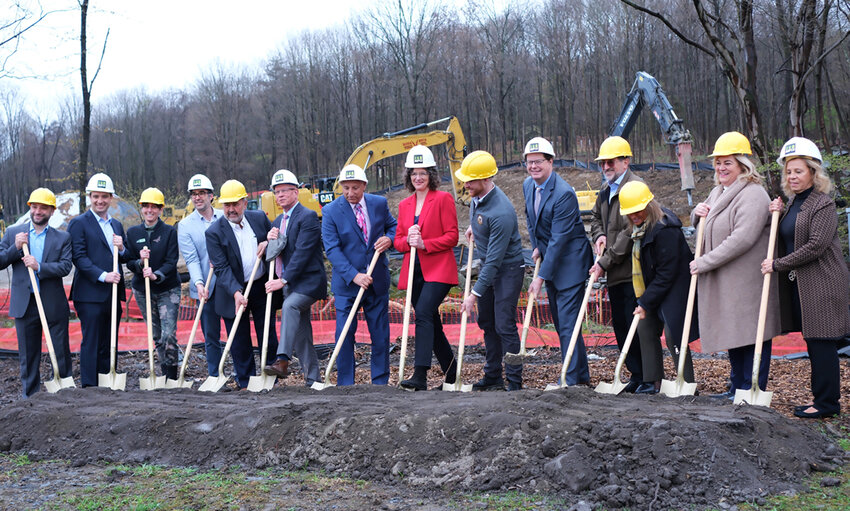 Richard Gerentine and representatives involved in the Silver Gardens Project broke ground on Silver Gardens last week. Pictured L-R Austin and Adam Gerentine of Girondini, Emily Hamilton, Managing Director of Real Estate Development for RUPCO; Lorne Norton, Sr. Real Estate Development Project Manager for RUPCO, David Plavchak, Town of Lloyd Supervisor; Kevin O’Connor, RUPCO CEO; Richard Gerentine of Girondini; Jen Metzger, Ulster County Executive, Abe Uchitelle - Ulster County Legislator; Darren Scott of NYS Homes and Community Renewal, Upstate East Director of Development; Richard Heese, RUPCO Board Chairman; Joanie Straussman Brandon – Neighbor Works America Northeast Regional Vice-President; Gina Hansut, Ulster County Legislator and Mary Paden, Senior VP of the Community Preservation Corporation.