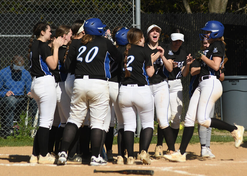 The Valley Central Vikings greet Emilia Brundage at home plate after she hit a two-run home run during Thursday&rsquo;s OCIAA Division II softball game at Warwick Valley Middle School.