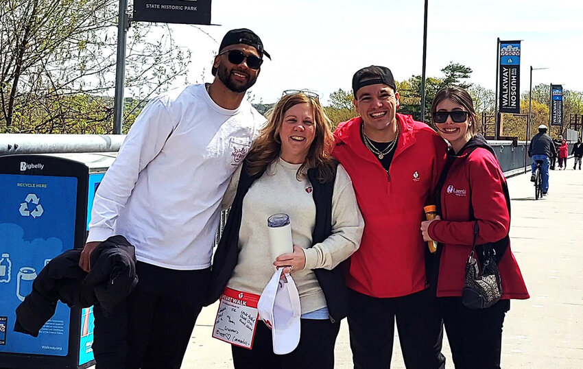 Donna Kosack, second from left, a past chair of the Hudson Valley Heart Walk, celebrates the 2024 Heart Walk  on the Walkway Over the Hudson on April 27 with her family. Donations will be accepted for the Heart Walk until June 30 at heart.org/hudsonvalleyheartwalk.