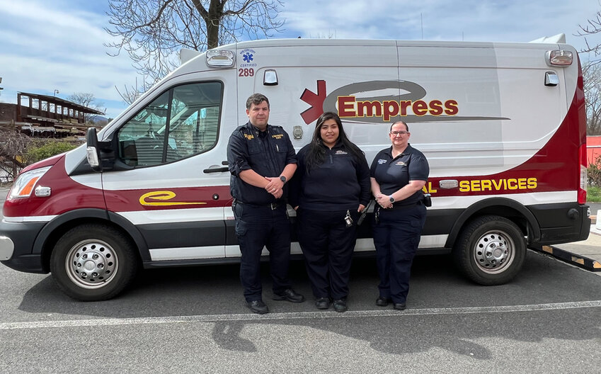 Captain Robert Szeli, EMT Maria Alvarez and Paramedic Jennifer Stroppel of Empress Emergency Medical Services stand alongside one of their units. Empress EMS will serve the City of Newburgh over the next three years with dedicated ambulance and medical services.