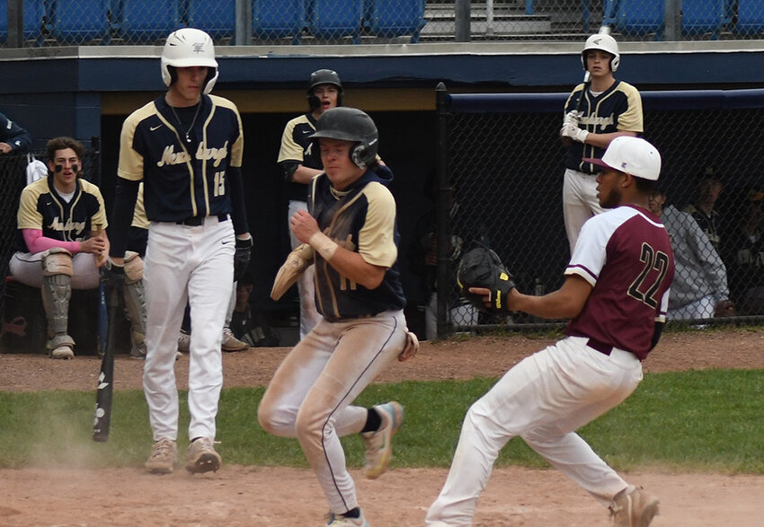 Newburgh&rsquo;s Nick Schmidt scores as James I. O&rsquo;Neill pitcher Yandhel Fernandez covers home plate and Newburgh&rsquo;s D.J. Clifford looks on during Saturday&rsquo;s non-league baseball game at Delano-Hitch Stadium in Newburgh.