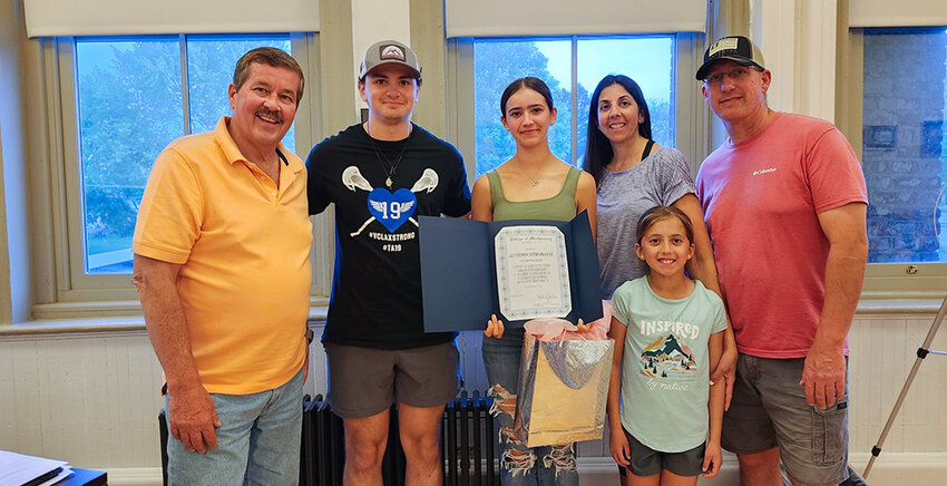 Mayor Mike Hembury (far left) with Autumn Strobach (center) and her family.