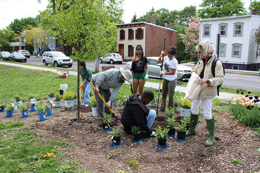 Newburgh Free Academy West Campus students and members of the Garden Club of Orange and Dutchess Counties joined together on Friday, May 3 for an afternoon of planting in Downing Park.