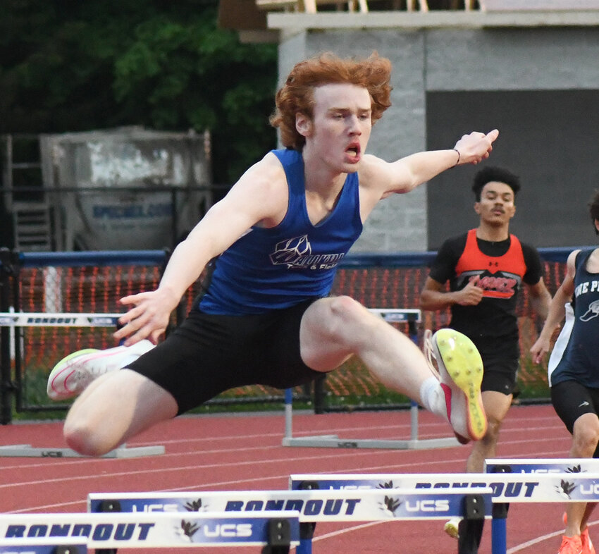 Wallkill&rsquo;s Finnian Reiter runs the boys&rsquo; 400-meter hurdles during Thursday&rsquo;s MHAL track and field championship meet at Rondout Valley High School in Accord.