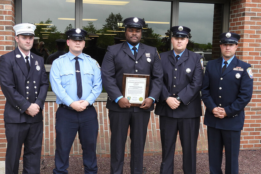 Octavious Fraser, center, from City of Newburgh Fire Department received the Civilian Recognition Award. While off duty at the Knox Village apartments in June 2023, Fraser saved the life of a drowning child by rescuing that child from the pool and successfully performing CPR.