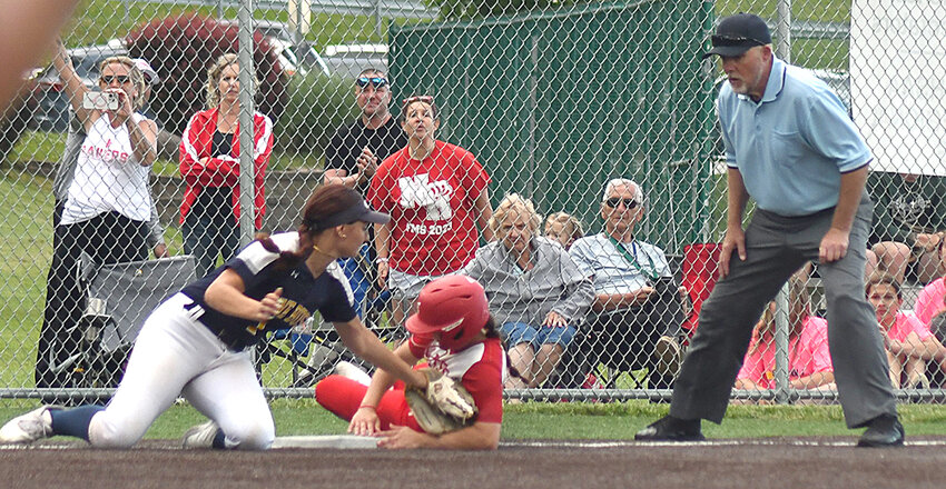 Pine Bush third baseman Kendall Morris tags out North Rockland&rsquo;s Emily Murphy during a NYSPHSAA Class AAA subregional softball game on May 28 at Monroe-Woodbury High School in Central Valley.