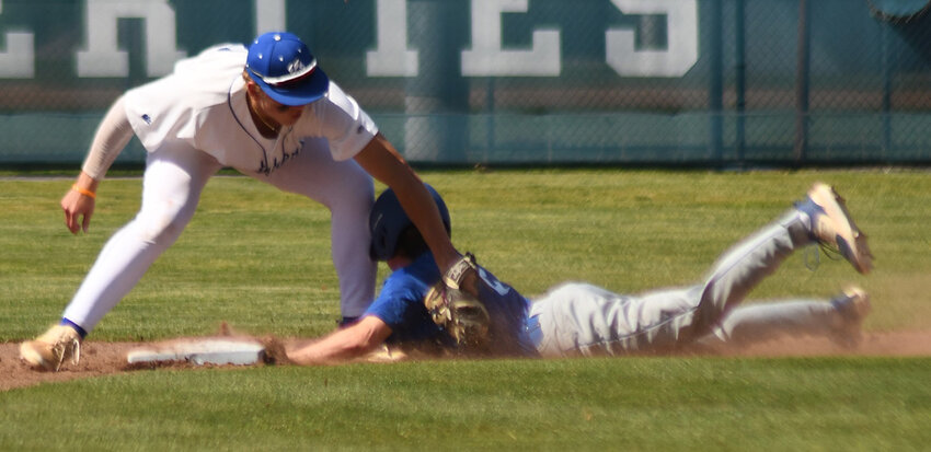 Wallkill shortstop Mason Franklin tags out Horseheads&rsquo; Patrick Laney at second base during Thursday&rsquo;s NYSPHSAA Class A subregional baseball game at Cantine Field in Saugerties.