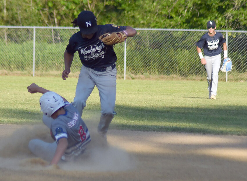 Newburgh Nuclears shortstop D.J. Aviles forces out Kingston’s Nick Drewnowski at second base during Thursday’s American Legion junior baseball game at the Town of Newburgh Little League complex.