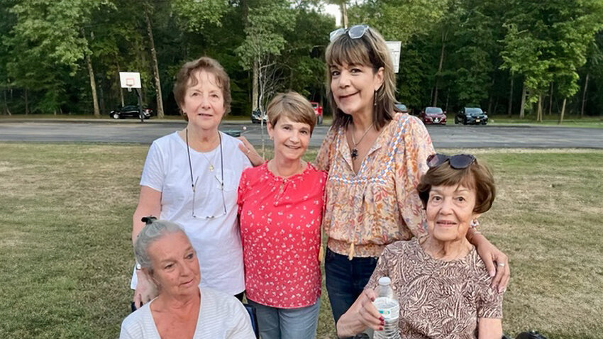 Anita (far right) with fellow Walden Community Council members enjoying the Music in the Grove concert series in September 2022.