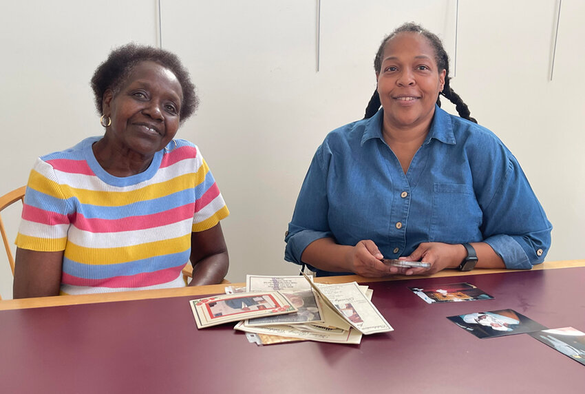 Mary Perdue and Michelle McQueen, shown here, have been using old News of the Highlands articles to help them create a historical presentation for the church set for Sunday, Sept. 8. They also thank Town of Highlands Historian Ronnie Coffey for help in finding documents and photos pertaining to the church.