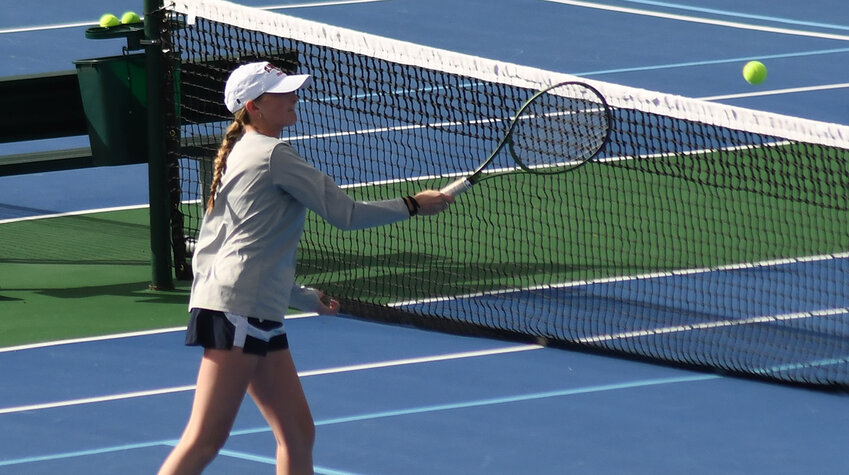 Highland’s Ella Fuller returns the ball during the MHAL girls’ tennis championship meet on Oct. 11, 2023, at FDR High School in Hyde Park.