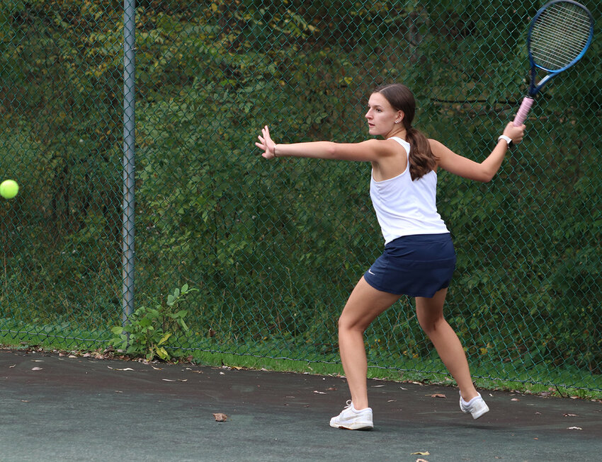 Newburgh’s Cora Kerin plays the ball during a girls’ tennis match last season.