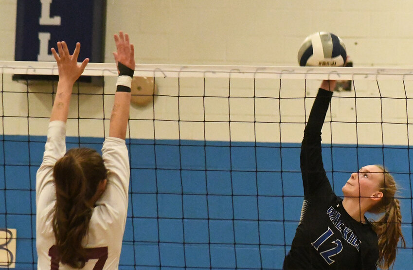 Wallkill’s Ava O’Flaherty sends the ball over the net during a Section 9 Class A championship volleyball match on Nov. 3, 2023, at Wallkill High School.