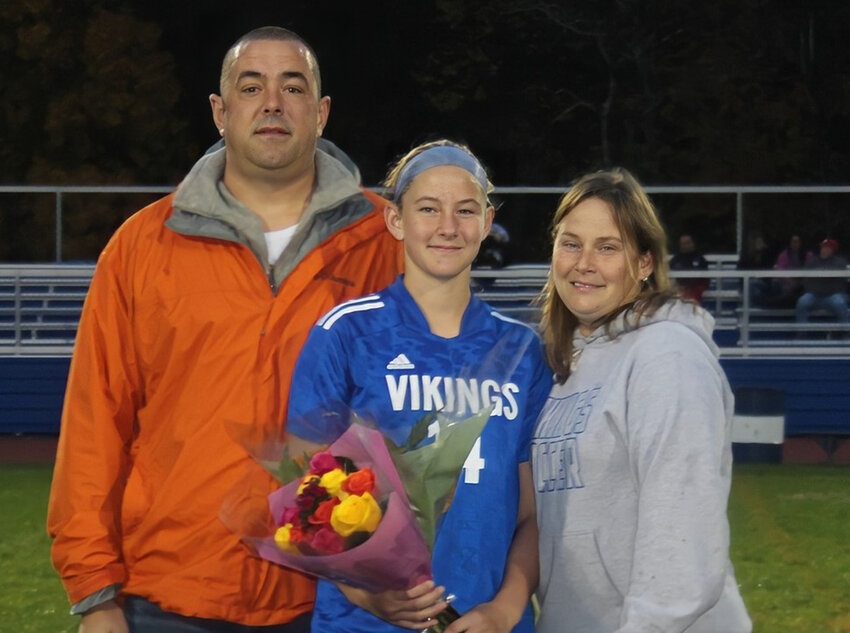 Sharon Delmonico, right, is shown with her daughter, Mackenzie Delmonico, and her husband, Kevin Delmonico, on Oct. 17, 2022, during Senior Night. Sharon Delmonico, Valley Central’s athletic trainer since 2015, died on Aug. 23, after a battle with Stage IV breast cancer.