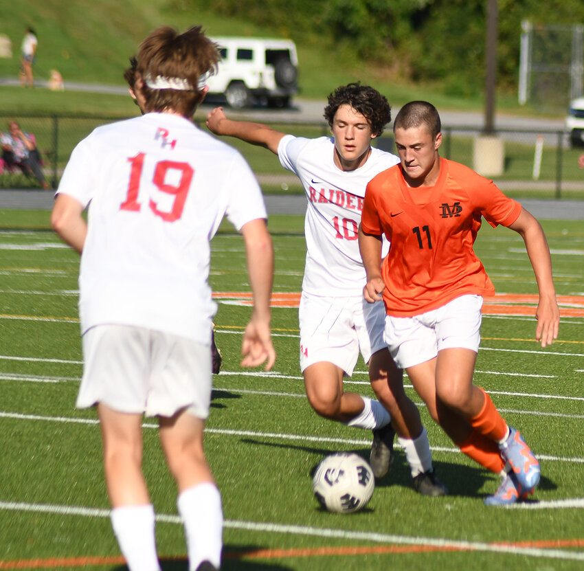 Marlboro’s Jake Brown turns the ball downfield as Red Hook’s Giacomo Buitoni (10) pursues during a MHAL Division II boys’ soccer game on Sept. 12, 2023, at Marlboro High School.