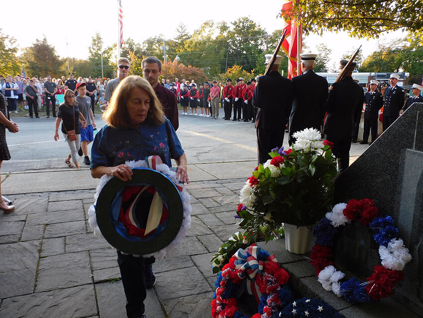 During the Patriot Day ceremony, Roxanne Galvin laid a wreath in honor of her husband, Robert, who died two years ago as a result of health-related complications from working in the area of Ground Zero.