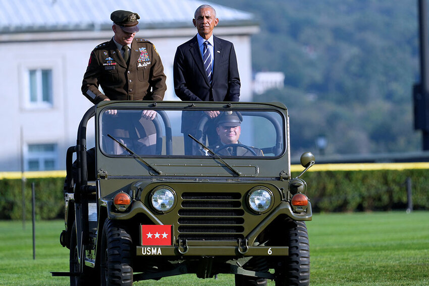 Former President Barack Obama rides in a Jeep with Lt. General / USMA Supt. Steve Gilland during  a parade / review in his honor for receiving the Sylvanus Thayer Award.