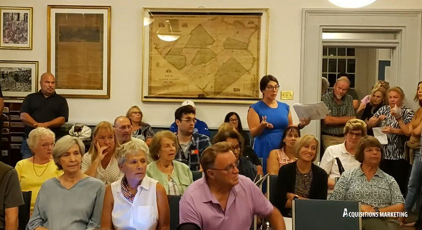 Residents overflow into the hall at the Board of Trustees September 17th meeting.