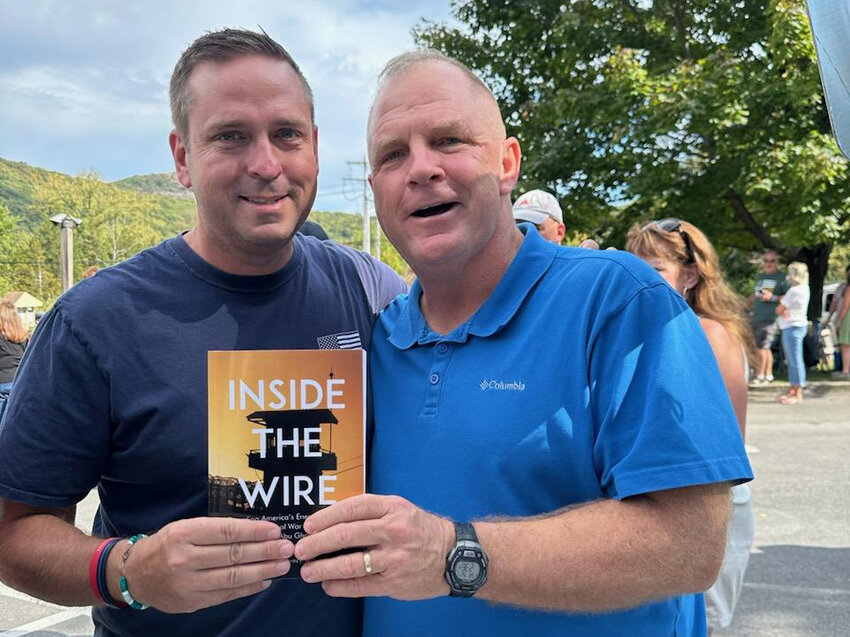 County Executive Steve Neuhaus provided a testimonial for Maj. Gen. John Hussey’s first book, “Inside the Wire: Guarding America’s Enemy Prisoners in the Global War on Terror from Abu Ghraib to Guantanamo Bay.” Last month Hussey visited Neuhaus to give him a copy of the book.