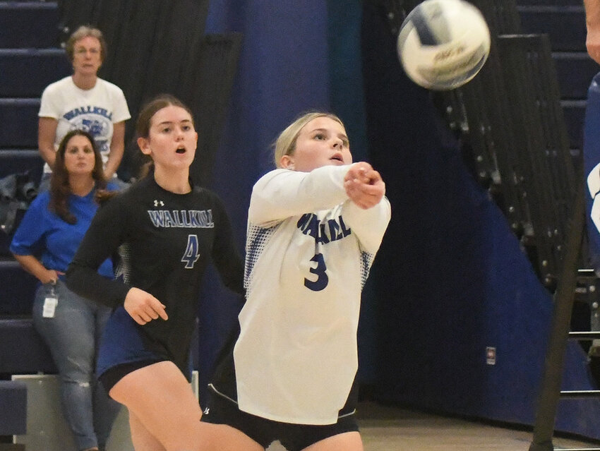 Wallkill’s Sophia Crinieri hits the ball over the net.