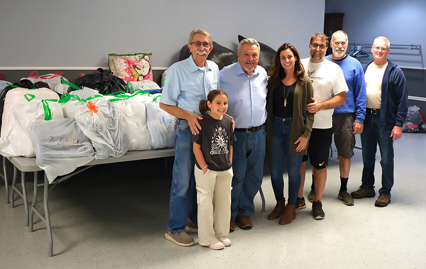 The American Legion Hall in Highland became a collection point for much needed pillows and blankets that were brought to North Carolina. Pictured (l. - r.) Lenny Auchmoody, Lily Auchmoody, Becky Auchmoody, Willie Auchmoody, Steve Toth and American Legion Commander John Gallagher.