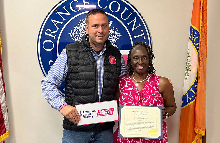 Newburgh resident Carol Johnson-Cromer, October’s Citizen of the Month, with Orange County Executive Steve Neuhaus.