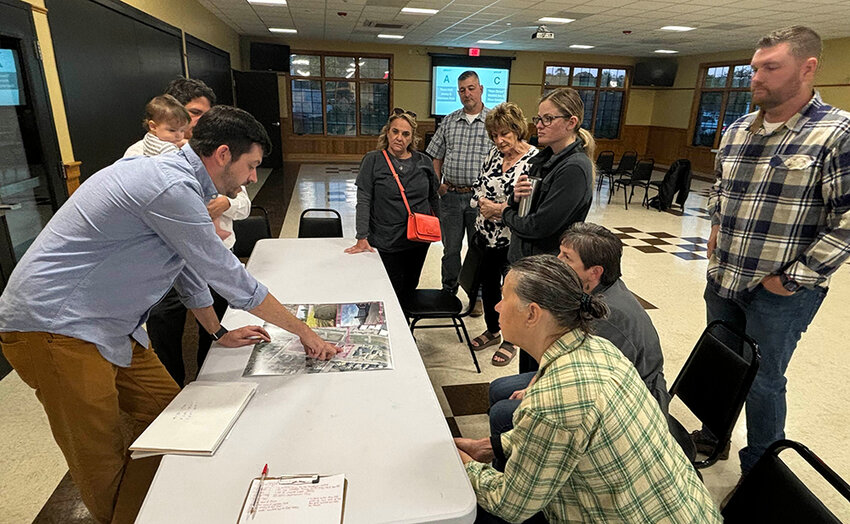 Eric Pierson (left) with town and hamlet residents, discussing ideas for the town hall and Garrison Park.