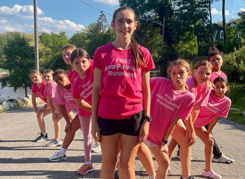 O’Neill High School junior Erin Smith (front) and some of the members of her Fast & Furious Running Club, in a photo taken as they trained at Roe Park last spring.