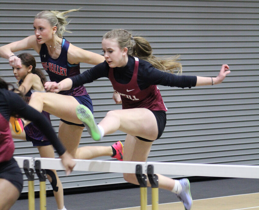 Ava Nowicki competes in the hurdles.