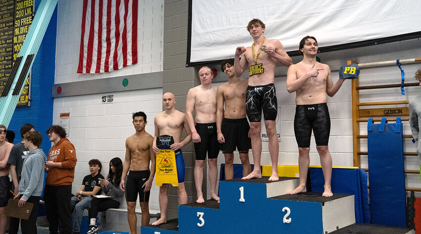 Jackson Hujus of Pine Bush (far right) earned a second-place finish in the 100-yard butterfly.