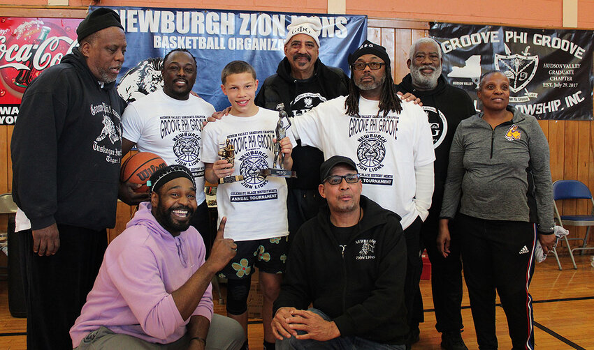 The White team led by Coach Ali T. Muhammad [in purple] claimed victory in the tournament.