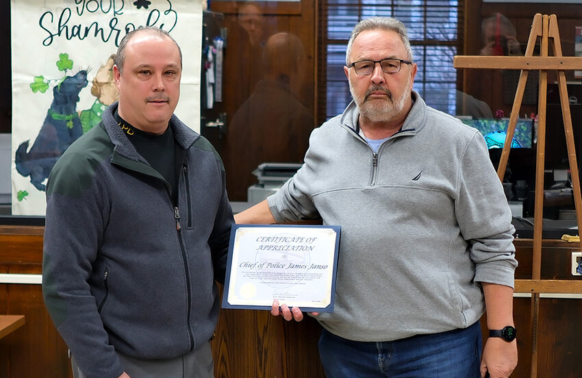 Town of Lloyd Supervisor Dave Plavchak [right] presented Police Chief James Janso with a Certificate of Appreciation for his 35 years of service to the community.