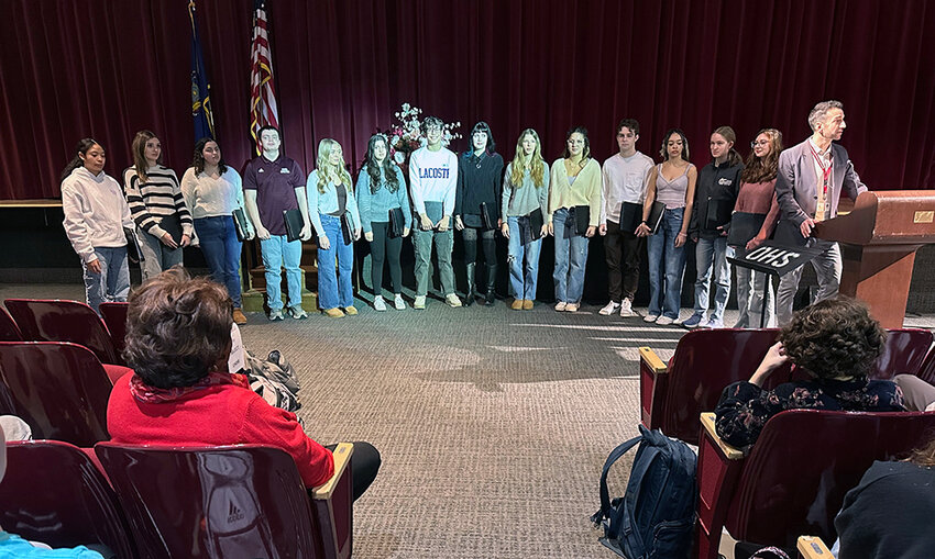 Ann Molina watches as the O’Neill High School Select Chorus performed Lift Every Voice and Sing on February 28.